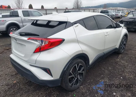2021 Toyota C-Hr Xle z USA, uszkodzony, nr VIN JTNKHMBX2M1099077